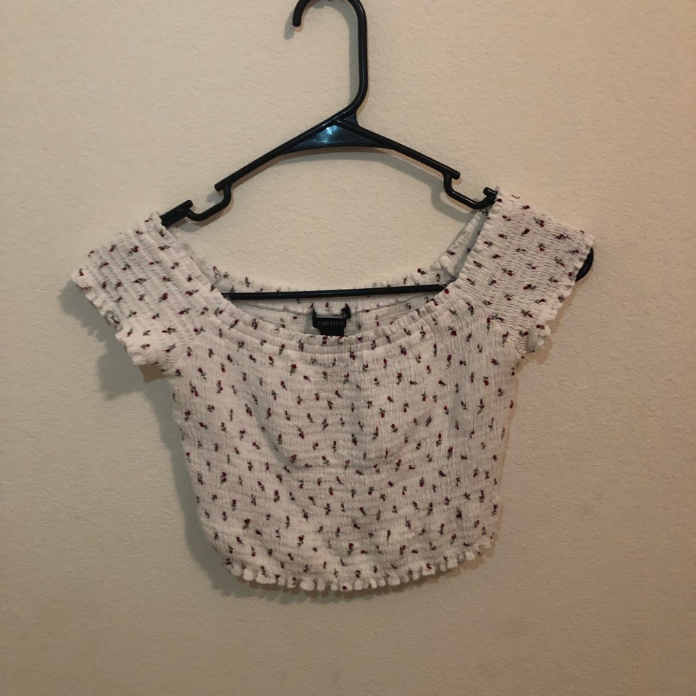 Off the shoulder white floral crop top. Runs small
